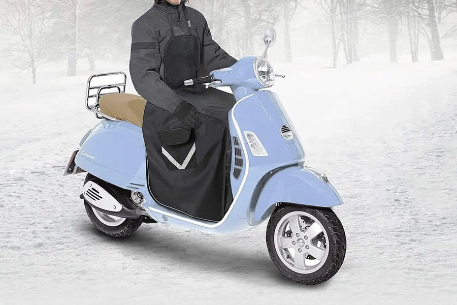 Hoe monteer je een scooter beenkleed?