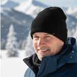 heren muts die in de sneeuw gedragen wordt