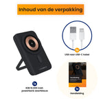 Powerbank draadloos wit met inhoud van de verpakking, inclusief USB-C kabel en handleiding.