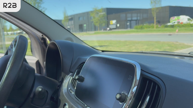 telefoonhouder auto met elektrische zuignap wordt uitgepakt en geinstalleerd.