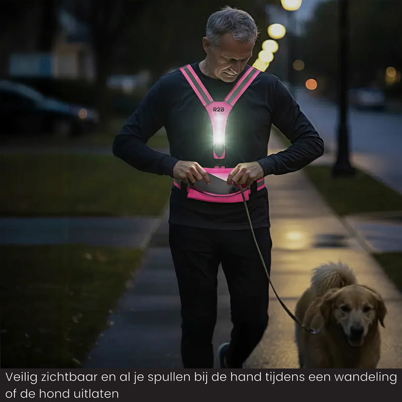 verlicht hardloopvest met telefoonhouder waarbij je makkelijk je spullen kan opbergen