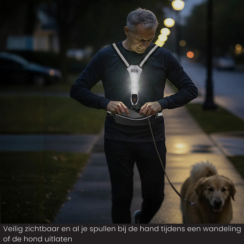 verlicht hardloopvest met telefoonhouder waarbij je makkelijk je spullen kan opbergen