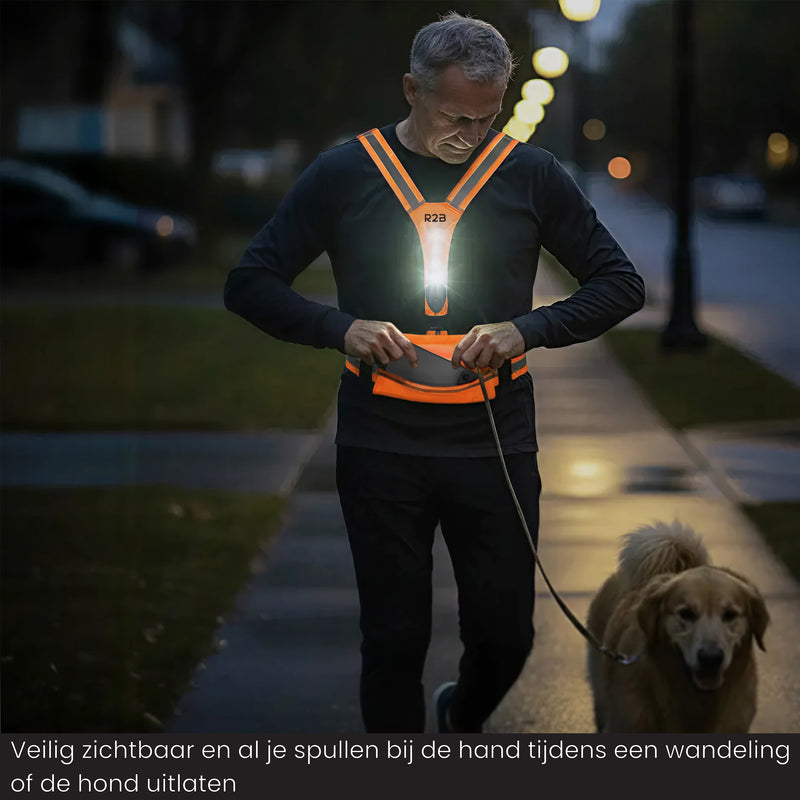 verlicht hardloopvest met telefoonhouder waarbij je makkelijk je spullen kan opbergen